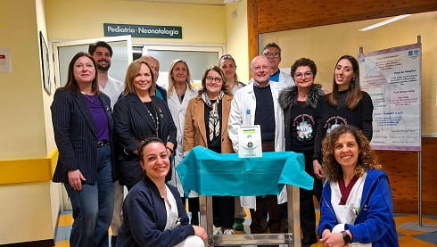 la foto degli operatori con il nuovo macchinario